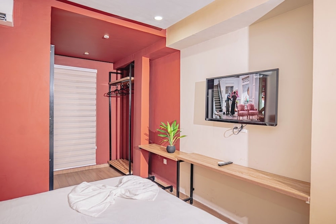 Imagen de la habitación del Hotel Le Nid Resort. Foto 12