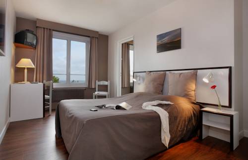 Imagen de la habitación del Hotel Le Normandy. Foto 1
