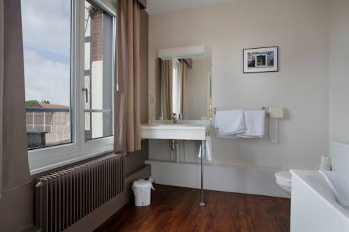 Imagen de la habitación del Hotel Le Normandy. Foto 3