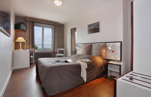 Imagen de la habitación del Hotel Le Normandy. Foto 4