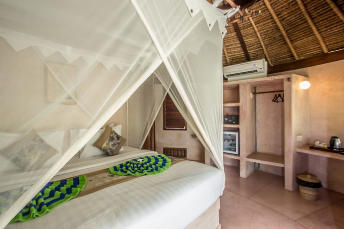 Imagen de la habitación del Hotel Le Nusa Beach Club. Foto 9