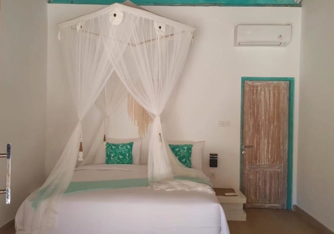 Imagen de la habitación del Hotel Le Nusa Beach Club. Foto 10