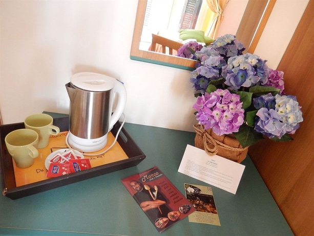 Imagen de la habitación del Hotel Le Orchidee. Foto 5