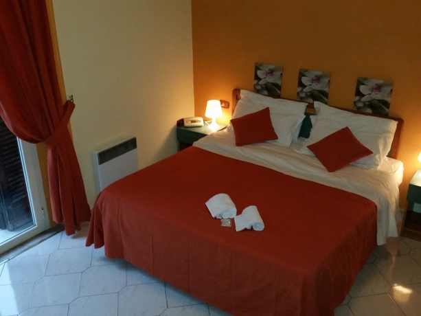 Imagen de la habitación del Hotel Le Orchidee. Foto 9