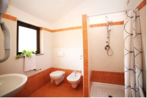 Imagen de la habitación del Hotel Le Oreadi. Foto 6