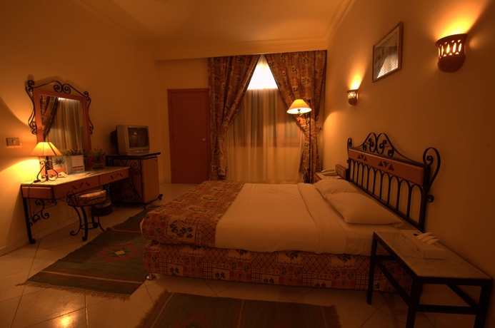 Imagen de la habitación del Hotel Le Pacha Resort. Foto 6