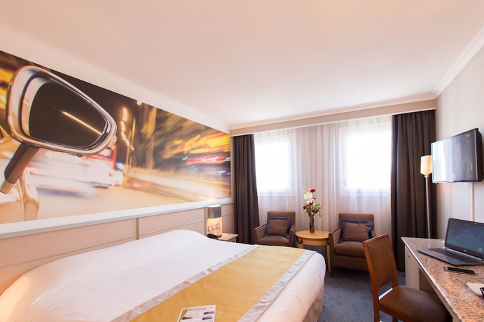 Imagen de la habitación del Hotel Le Paddock. Foto 5