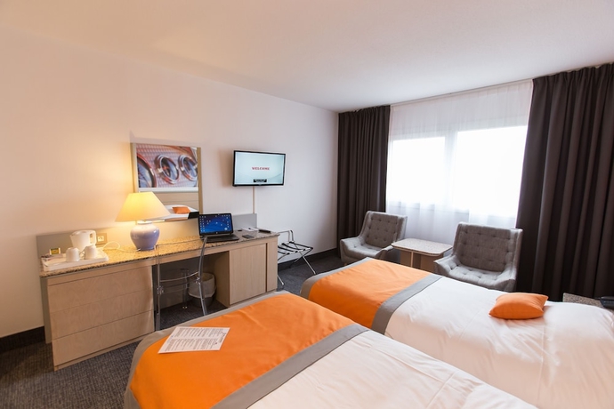 Imagen de la habitación del Hotel Le Paddock. Foto 15