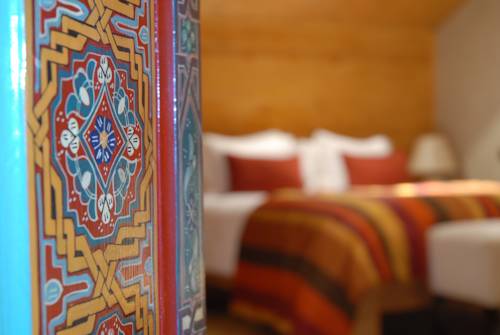 Imagen de la habitación del Hotel Le Palais Des Cerisiers. Foto 14