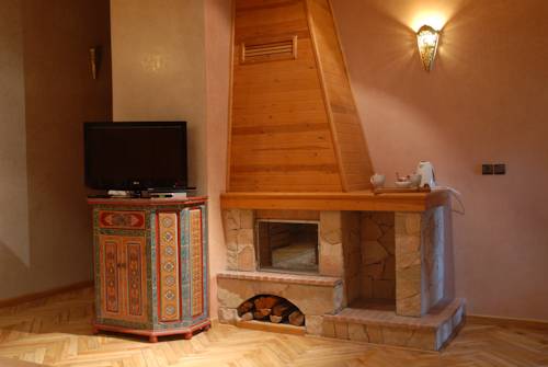 Imagen de la habitación del Hotel Le Palais Des Cerisiers. Foto 15