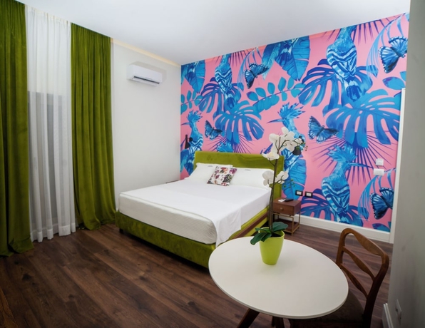 Imagen de la habitación del Hotel Le Palazzine. Foto 18