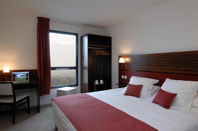 Imagen de la habitación del Hotel Le Palladior. Foto 6