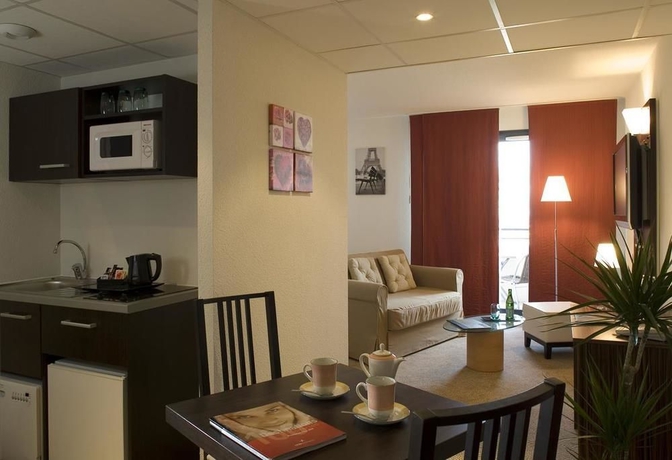 Imagen de la habitación del Hotel Le Palladior. Foto 7