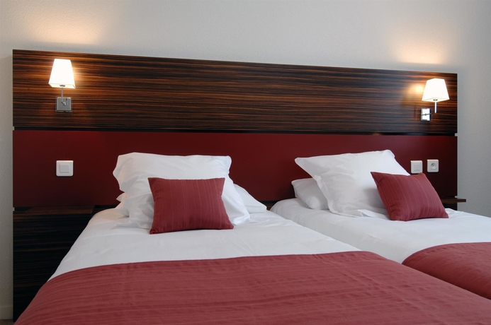 Imagen de la habitación del Hotel Le Palladior. Foto 8