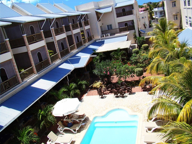 Imagen de la piscina del Hotel Le Palmiste. Foto 7