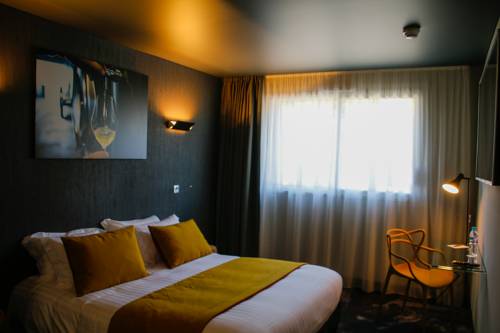 Imagen de la habitación del Hotel Le Panoramic. Foto 2