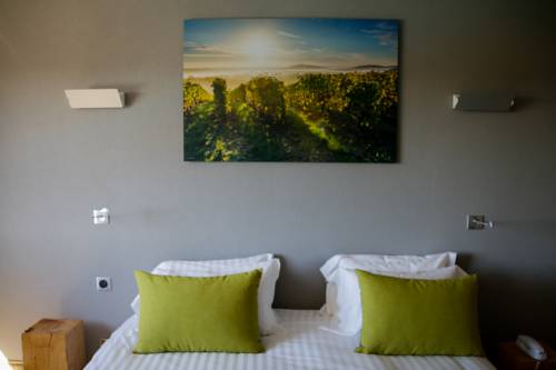 Imagen de la habitación del Hotel Le Panoramic. Foto 5