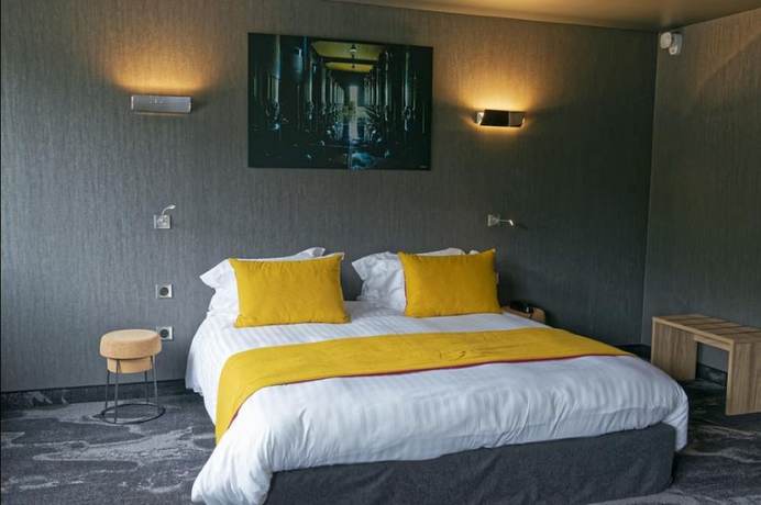 Imagen de la habitación del Hotel Le Panoramic Hôtel. Foto 12