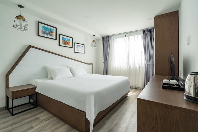 Imagen de la habitación del Hotel Le Parc Saigon. Foto 13