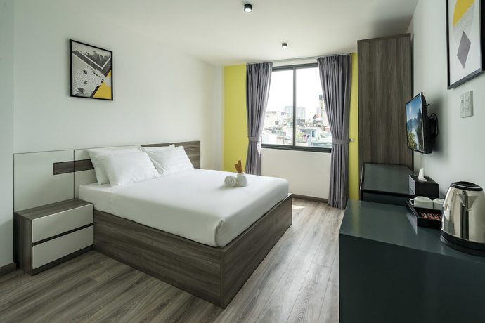 Imagen de la habitación del Hotel Le Parc Saigon. Foto 14