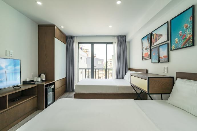 Imagen de la habitación del Hotel Le Parc Saigon. Foto 15