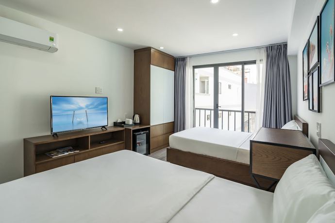 Imagen de la habitación del Hotel Le Parc Saigon. Foto 16