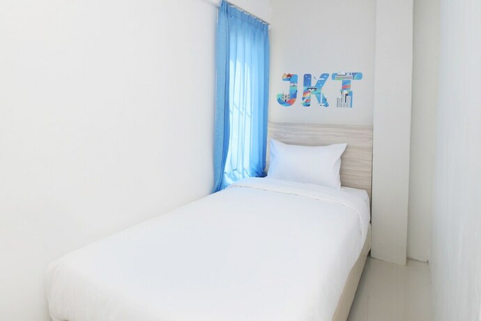 Imagen de la habitación del Hotel Le Paris Syariah Residence. Foto 18