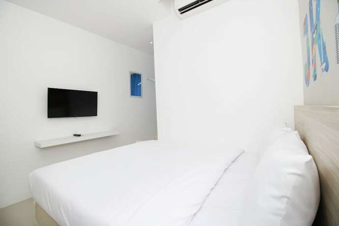 Imagen de la habitación del Hotel Le Paris Syariah Residence. Foto 21