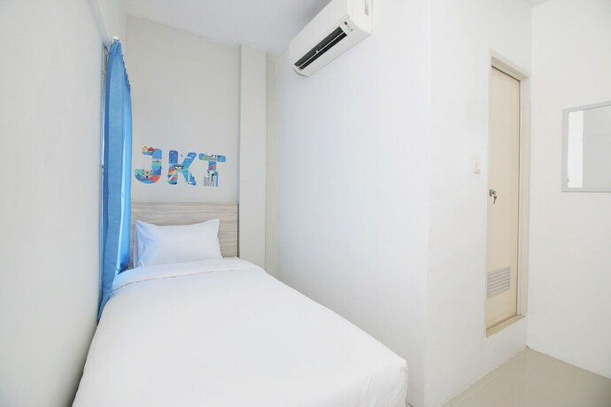 Imagen de la habitación del Hotel Le Paris Syariah Residence. Foto 26