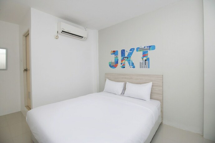 Imagen de la habitación del Hotel Le Paris Syariah Residence. Foto 28