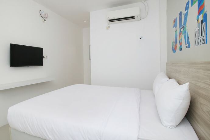 Imagen de la habitación del Hotel Le Paris Syariah Residence. Foto 29