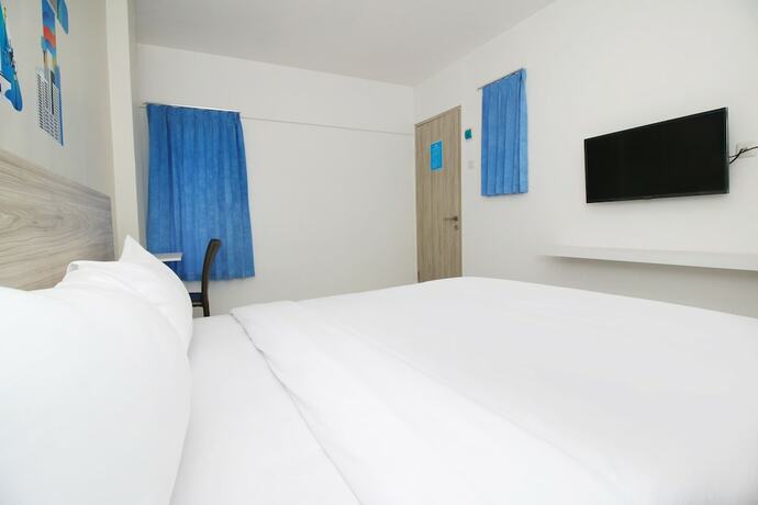 Imagen de la habitación del Hotel Le Paris Syariah Residence. Foto 30