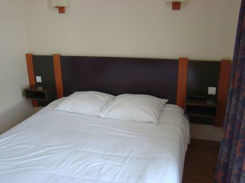 Imagen de la habitación del Hotel Le Passiflore. Foto 16