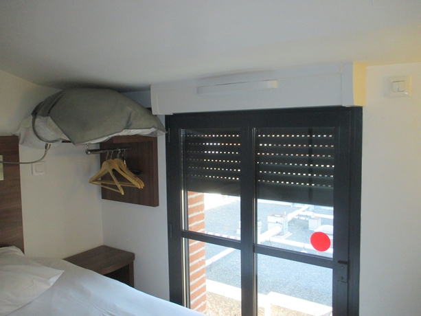 Imagen de la habitación del Hotel Le Pastel. Foto 4