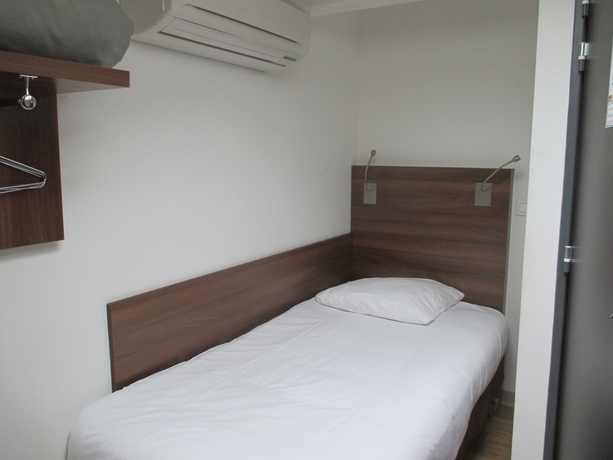 Imagen de la habitación del Hotel Le Pastel. Foto 15