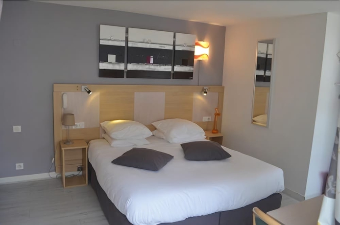 Imagen de la habitación del Hotel Le Patio, Deauville. Foto 3
