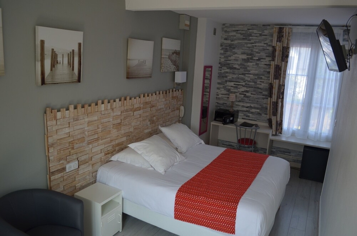 Imagen de la habitación del Hotel Le Patio, Deauville. Foto 14