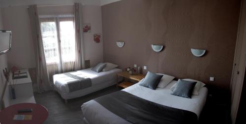 Imagen de la habitación del Hotel Le Pavillon Bleu, Royan. Foto 5