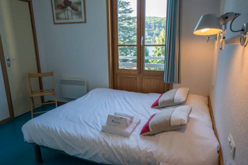 Imagen de la habitación del Hotel Le Pavillon Des Fleurs. Foto 4