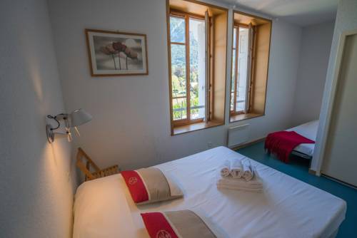 Imagen de la habitación del Hotel Le Pavillon Des Fleurs. Foto 6