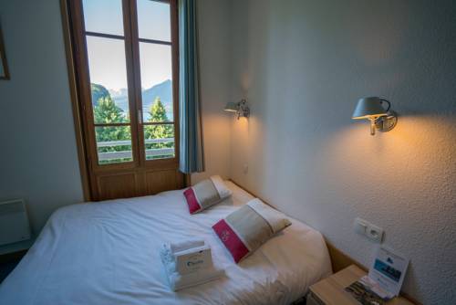 Imagen de la habitación del Hotel Le Pavillon Des Fleurs. Foto 7