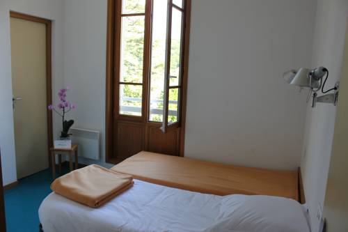 Imagen de la habitación del Hotel Le Pavillon Des Fleurs. Foto 8