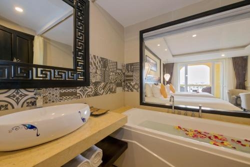 Imagen de la habitación del Hotel Le Pavillon Hoi An Luxury Resort and Spa. Foto 8