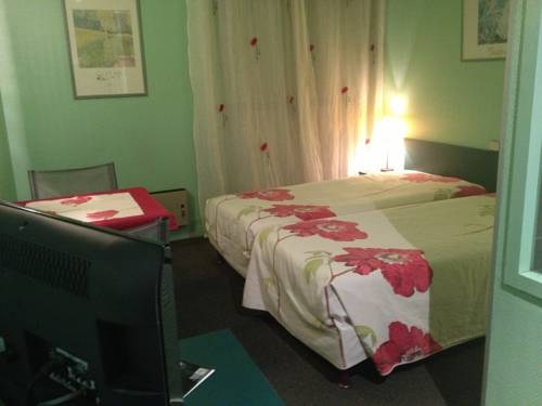 Imagen de la habitación del Hotel Le Pavillon, Le Cergne. Foto 2