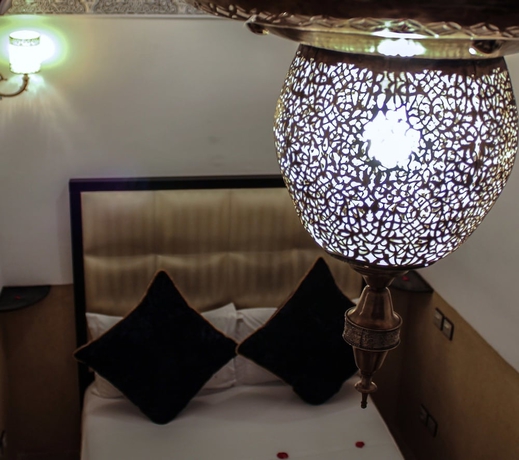 Imagen de la habitación del Hotel Le Pavillon Oriental. Foto 7