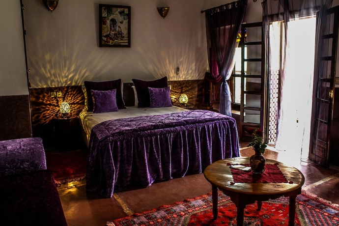 Imagen de la habitación del Hotel Le Pavillon Oriental. Foto 10