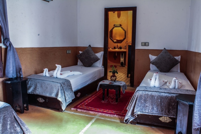 Imagen de la habitación del Hotel Le Pavillon Oriental. Foto 13