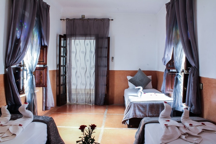 Imagen de la habitación del Hotel Le Pavillon Oriental. Foto 15