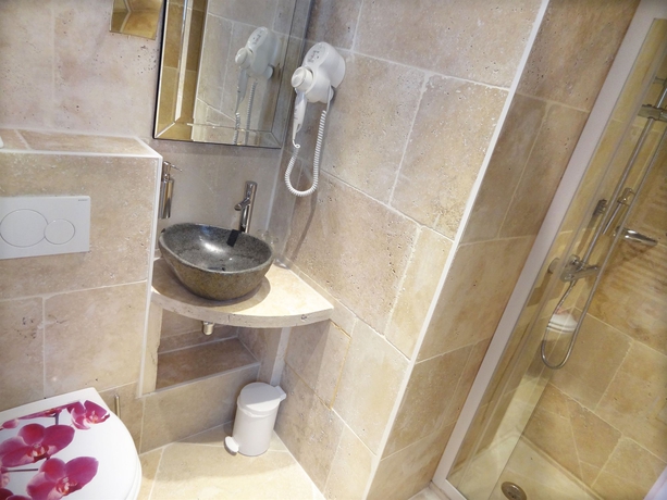 Imagen de la habitación del Hotel Le Pavillon, París. Foto 6