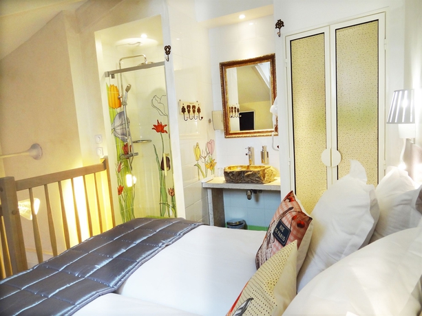 Imagen de la habitación del Hotel Le Pavillon, París. Foto 12